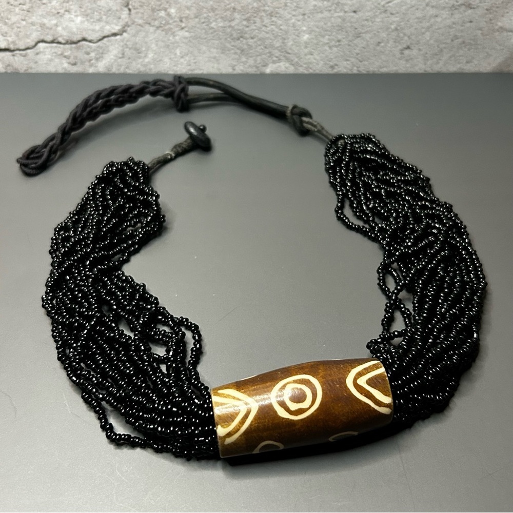 Unique Black Beaded Necklace with Wooden Accent